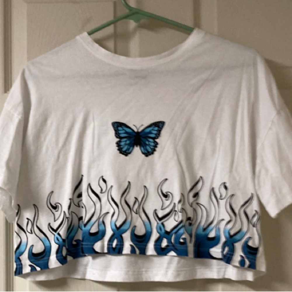 White crop top with a butterfly and flames on the front size large from rue 21